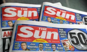 Picture of copies of Sun on Sunday newspaper